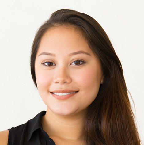 Beautiful young woman smiling at camera